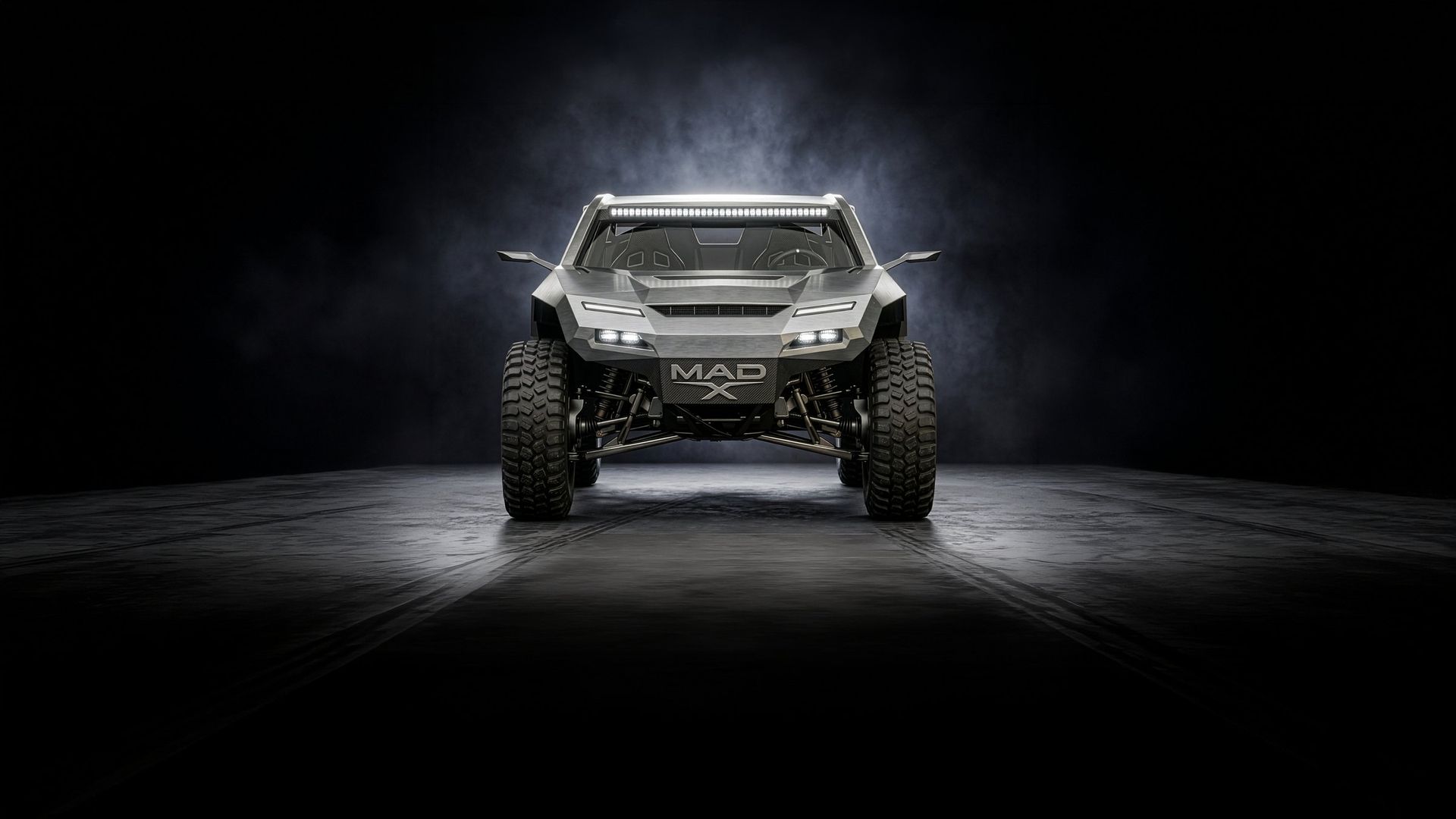 MAD X aggressive front stance emerging from fog
